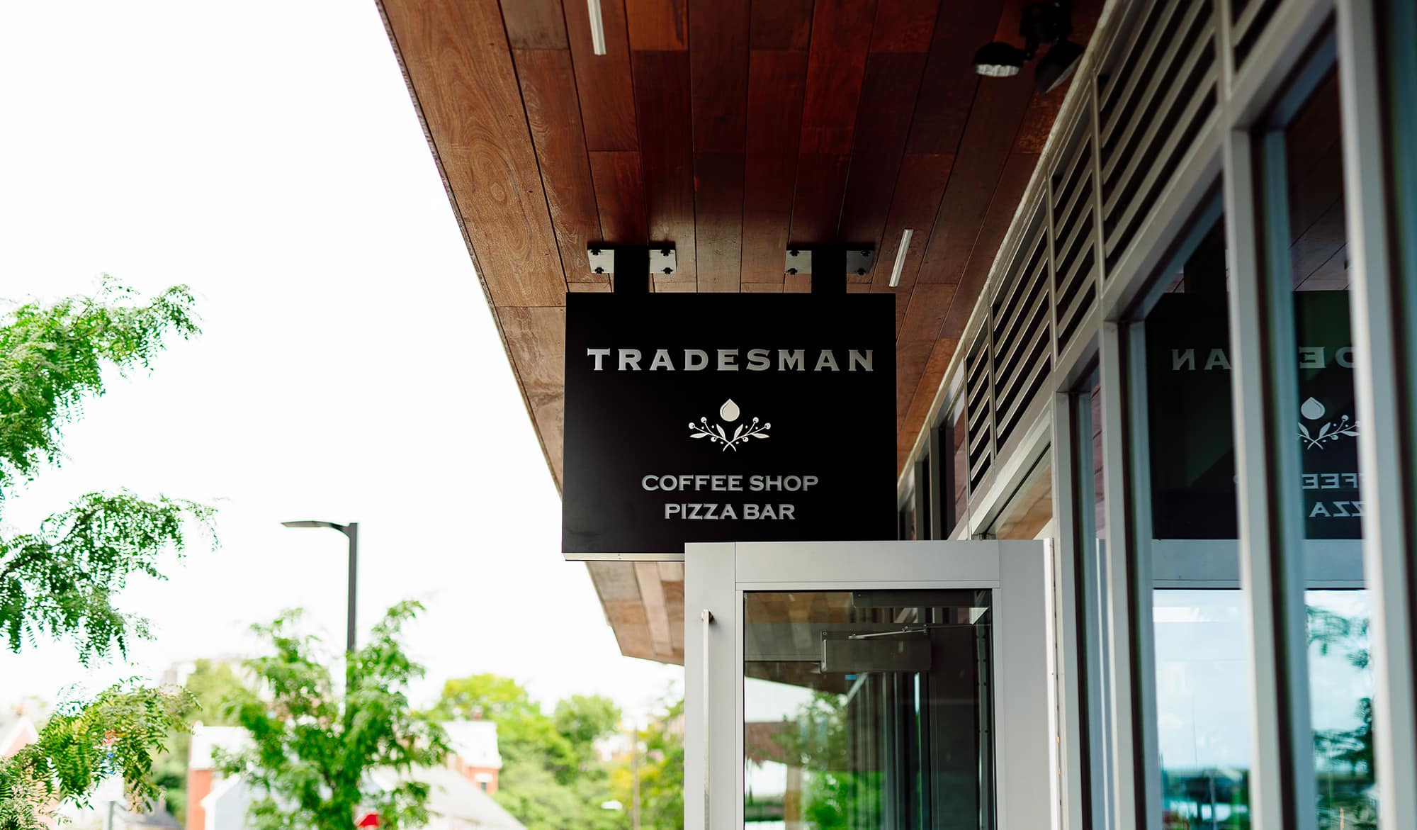 Sign for Tradesman Coffee Shop and Pizza Bar